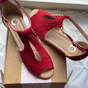 Red suede wedges. Brand new. Never worn. Size 12